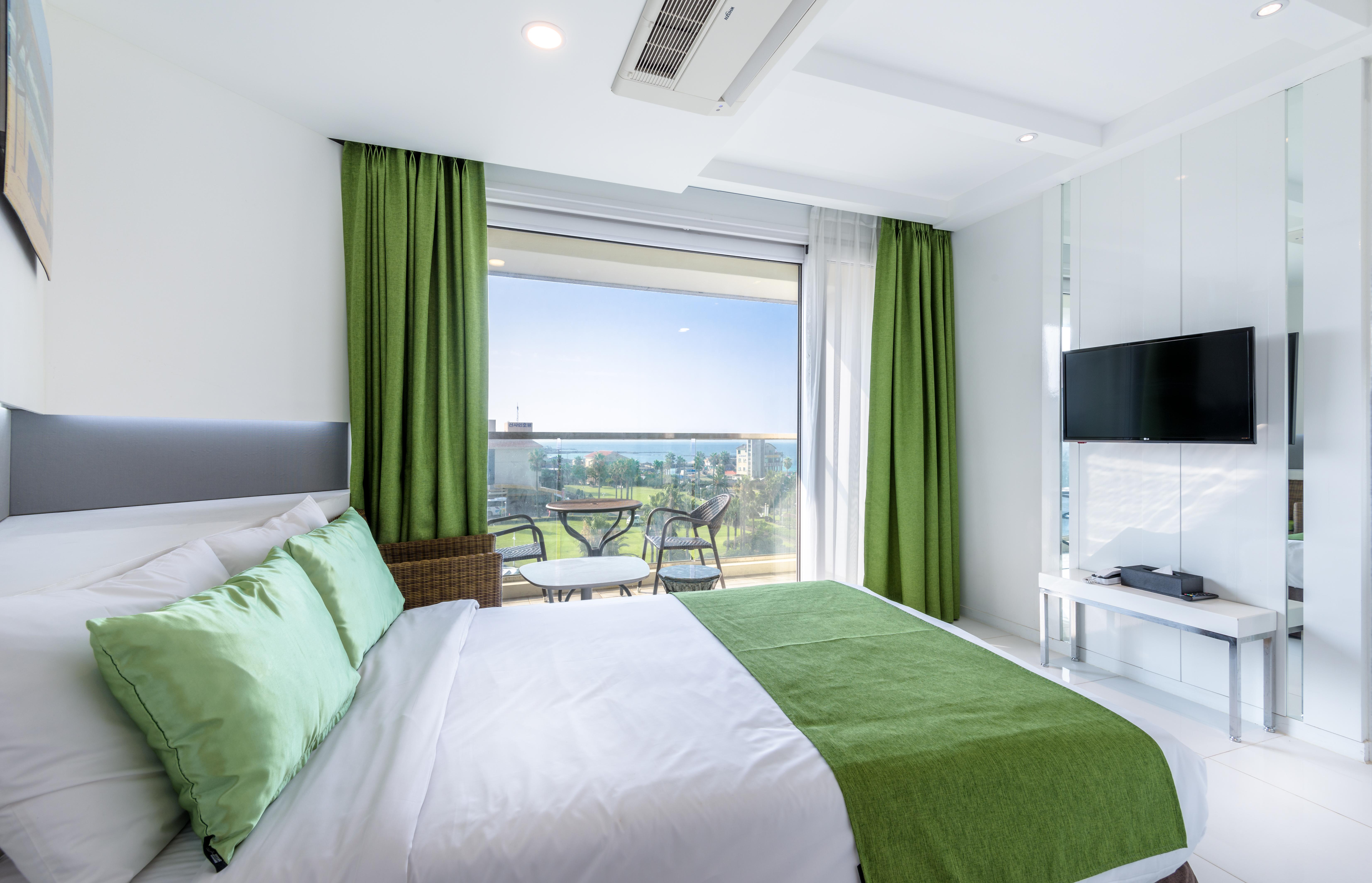 Aimi Jeju Beach Hotel Экстерьер фото