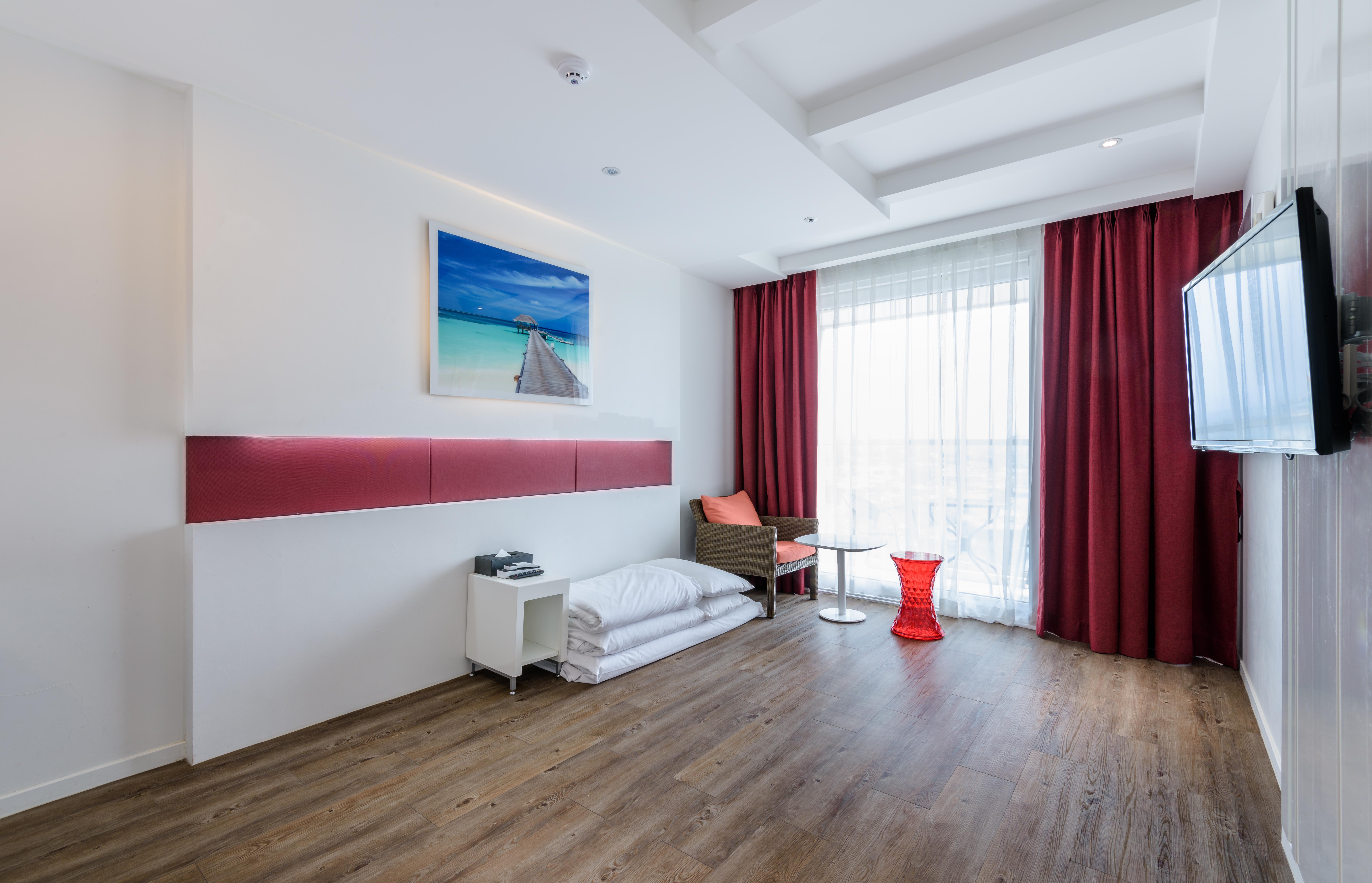 Aimi Jeju Beach Hotel Экстерьер фото
